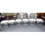 A set of six early 20thC mahogany framed dining chairs, the cream coloured, fabric covered seats,