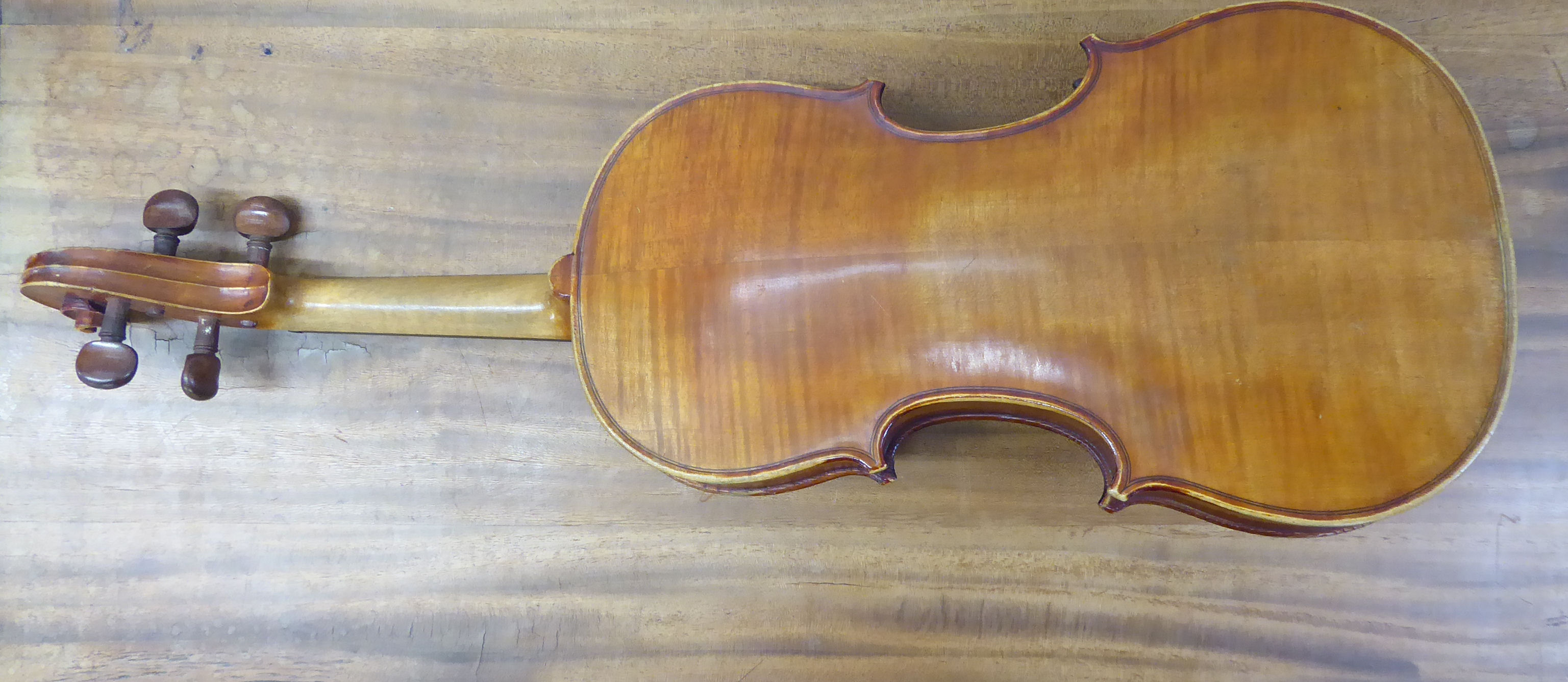 An early 20thC copy of an Antonius Stradivarius violin with a 14''L two piece back and a bow, - Image 2 of 8