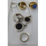 Three similar yellow/white metal plated Lalique coloured glass signet rings; a gold coloured metal,