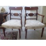 A pair of late 19thC Regency style mahogany framed elbow chairs with curved,