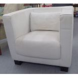 An Italian made stitched white hide upholstered horseshoe design armchair,