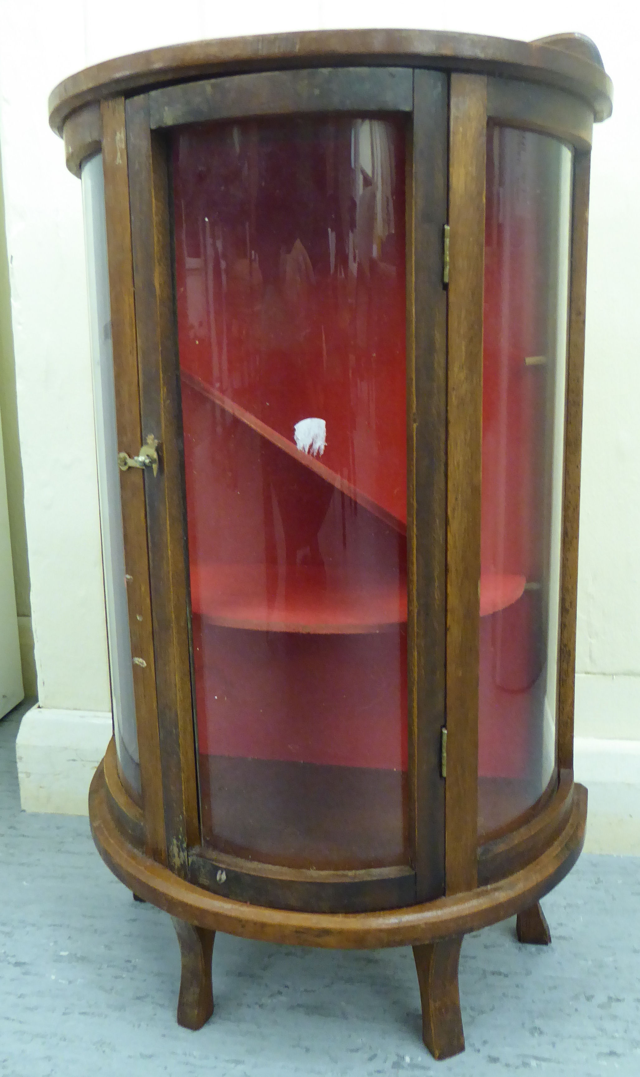 A 20thC mahogany miniature, partially glazed display cabinet,