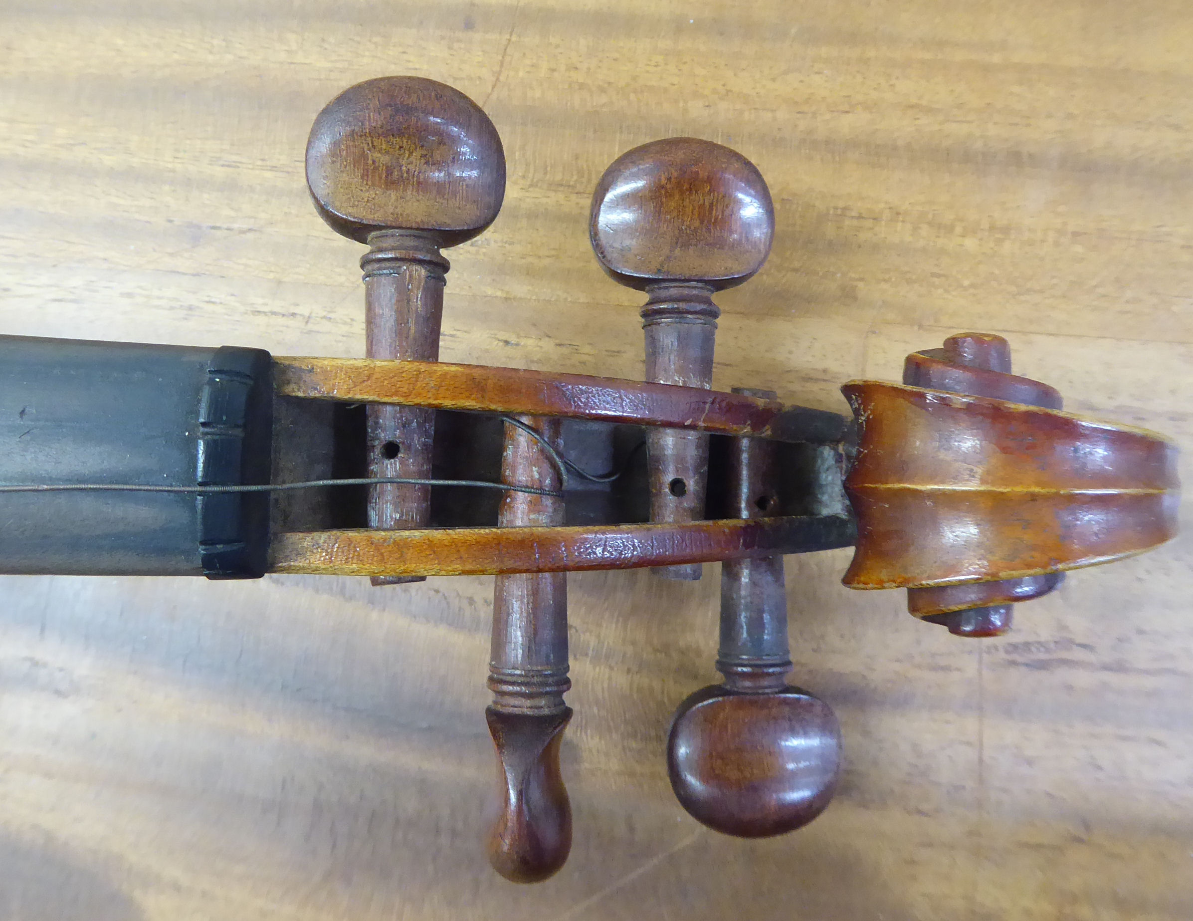 An early 20thC copy of an Antonius Stradivarius violin with a 14''L two piece back and a bow, - Image 3 of 8