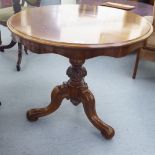 A reproduction of a Victorian mahogany pedestal table,