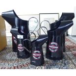 A graduated set of five painted metal oil cans, advertising Harley-Davidson 7.5''-12.