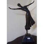 A 20thC Art Deco design cast and patinated bronze sculpture, a female dancer,