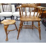 A Stewart Linford burr elm framed captains chair with a spindled back and a solid seat raised on