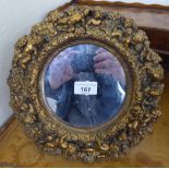 A Victorian design dressing table mirror, in an ornate gilt frame,