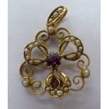 An 'antique' 9ct gold garnet and seed pearl set pendant 11