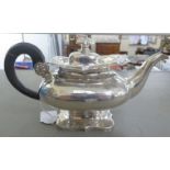 A late Victorian Dutch design silver small teapot of squat, square outline, having a swept spout,