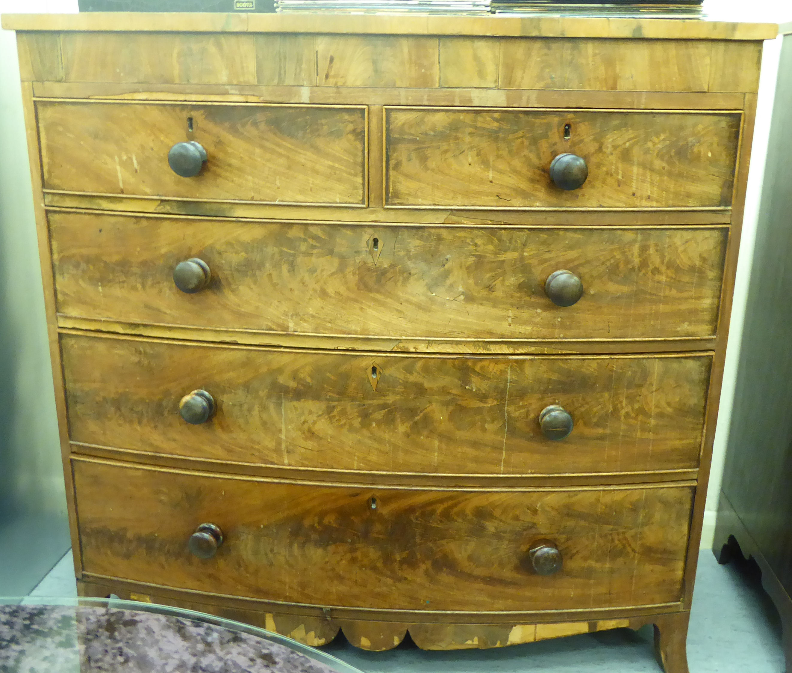 A mid/late 19thC crossbanded mahogany veneered,