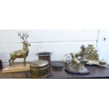 Decorative and functional 20thC metalware: to include a brass model, a stag,