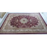 A Turkish machine made rug,