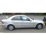 A Mercedes C200 Kompressor with silver livery, manual gearbox, registration no.