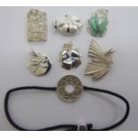 Seven items of modern silver jewellery: to include a part green enamelled scarab pendant;