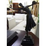 A 20thC Art Deco design cast and patinated bronze sculpture, a female dancer,