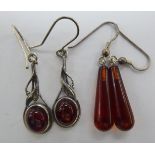 Two pairs of amber coloured pendant set earrings 11