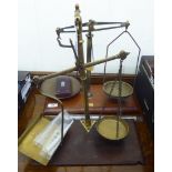 Two sets of early 20thC brass scales and other contemporary weights and accessories LSF