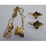 A silver gilt necklet with a leaf pendant and a pair of leaf earrings 11