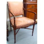 An American mahogany showwood framed 'Hickory' elbow chair,