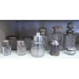 Mainly glass dressing table bottles and various jars with silver mounts: to include one star-cut