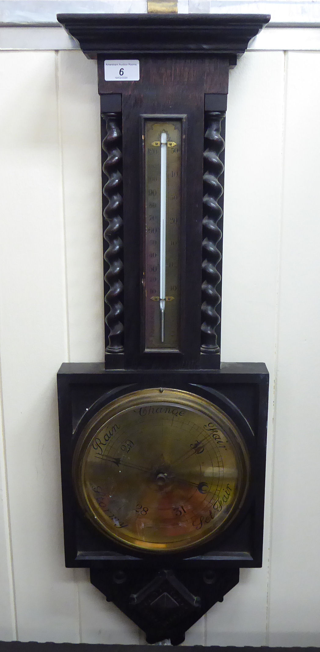 A 1920s oak cased barometer,