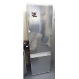 A Siemens (unused) integrated 70/30 fridge/freezer, in brushed silver casing 70''h 21.