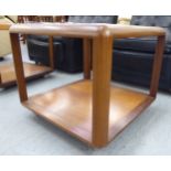 A G-Plan teak coffee table with an inset plate glass top, over an undershelf,