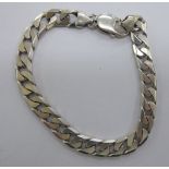A silver curb-link bracelet stamped 925 11
