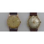 Two gold coloured metal cased wristwatches, faced by Arabic and baton dials,