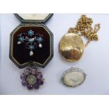 Four items of personal ornament: to include a 9ct gold pendant,
