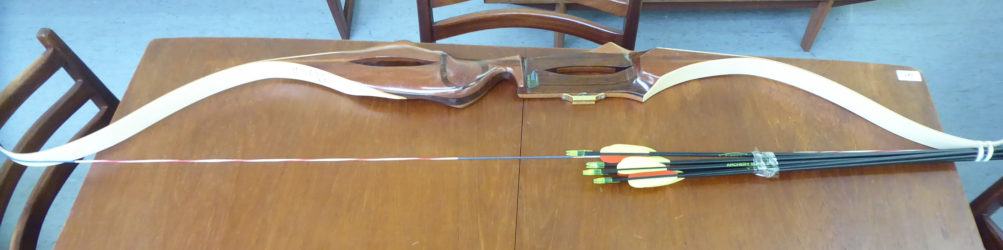 A Royal Stuart of Scotland walnut and resin archers bow, model no.