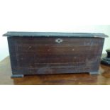 A late Victorian mahogany cased music box with straight sides and a hinged lid,