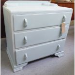 A mid 20thC light blue painted oak three drawer dressing chest,