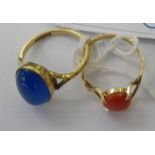 Two yellow metal rings,