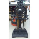 A Victorian design black painted cast iron stickstand with a tray base 34''h 16''w CS
