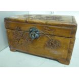 A 20thC Chinese camphorwood jewellery casket, carved with birds and bamboo,