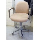A Verco desk chair, the peach coloured upholstered,