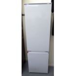 A Smegg (unused) 70/30 split integrated fridge/freezer 69''h 23.