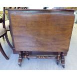 A mid 19thC mahogany Sutherland table, raised on reeded,