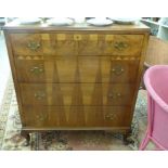 A 1930s crossbanded mahogany four drawer dressing chest,