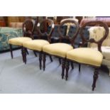 A set of four late Victorian mahogany framed balloon back dining chairs,