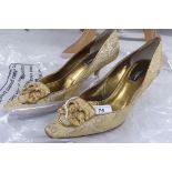 A pair of lady's Dolce & Gabbana, Vero Cuoio, gold coloured brocade shoes with chisel toes,