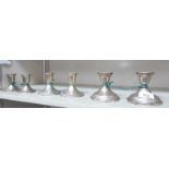 Three pairs of similar Sterling silver dwarf candlesticks 3''-3.