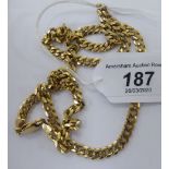 A gold coloured metal (possibly 9ct) chiselled flat curb link necklace,