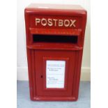 A red painted cast iron post box 17''h 9.