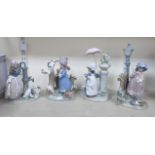 A set of four Lladro porcelain figures, viz. 'Winter' 'Autumn' 'Summer' and 'Spring' 9.