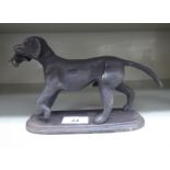 A patinated cast iron model, a gun dog 5.