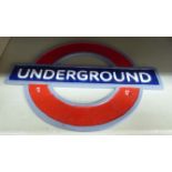 A painted cast metal London Underground sign 10.