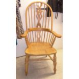 A modern beech and pine framed double splat and spindled back Windsor armchair,